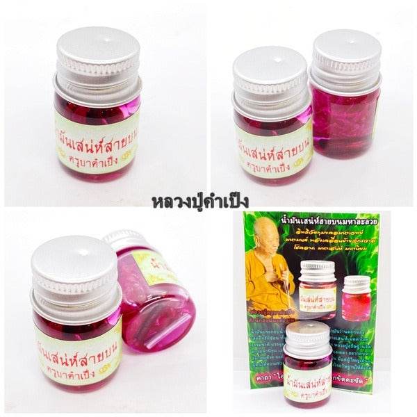 Maha Laluay spiritual attraction oil in small bottles, used for enhancing positive energy and attraction.