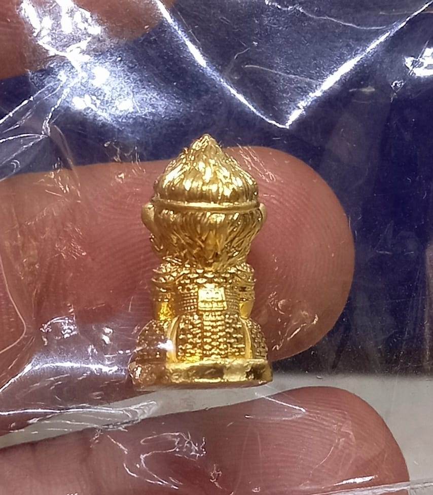 Monkey King fortune amulet in gold color, depicting the back of the monkey figure for good luck and prosperity