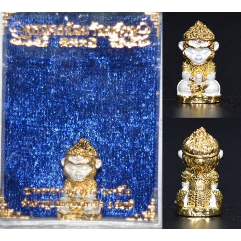 Monkey King fortune amulet on a blue background, featuring detailed craftsmanship and a golden exterior