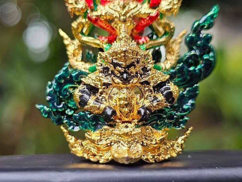 Narayana on Garuda amulet intricately designed with gold and vibrant colors for spiritual decoration