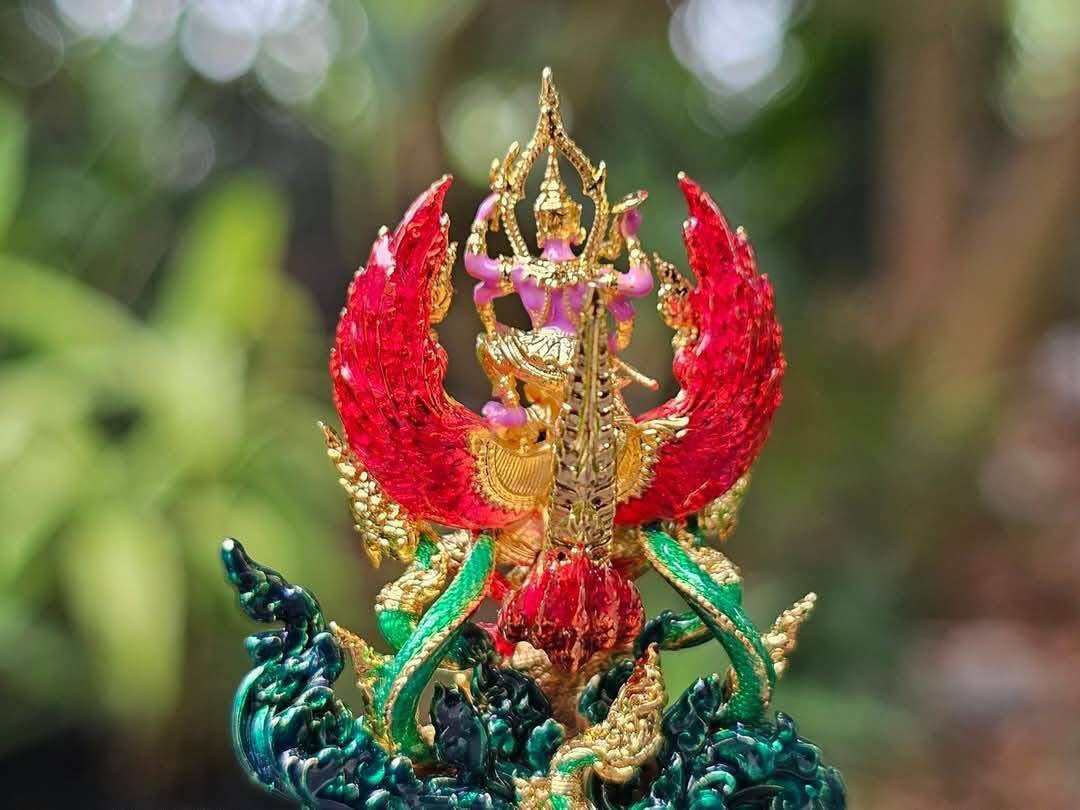 Narayana on Garuda amulet beautifully crafted in vibrant colors, symbolizing divine protection and strength.