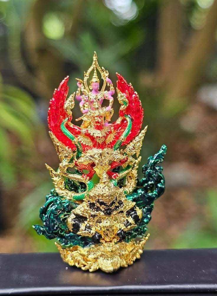 Narayana on Garuda amulet intricately designed with vibrant colors and detailed craftsmanship