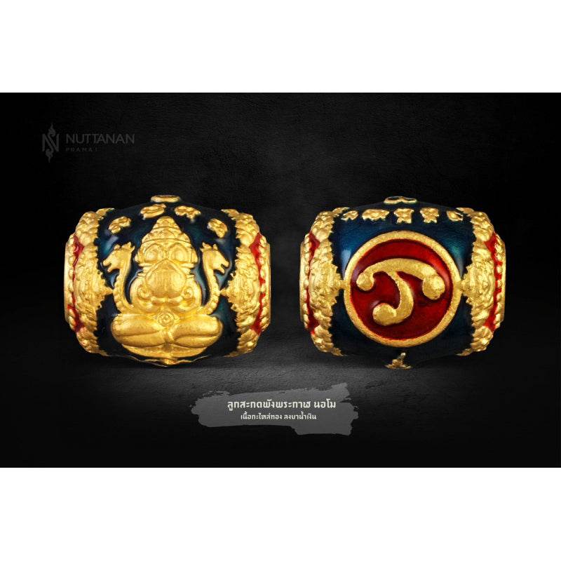 Billionaire Prosperity Thai amulet ornate gold and navy barrel charm with Thai deity relief and red medallion