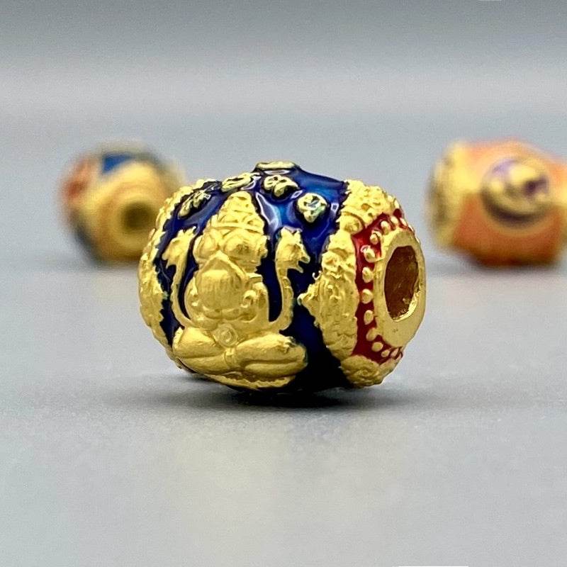 Blue enamel and gold bead charm with embossed deity detail for bracelets Billionaire Prosperity Thai amulet
