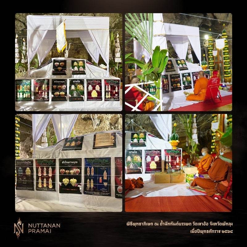 Phaan Thai luck amulet set displayed under white ceremonial canopy with boxed amulets and people in orange robes