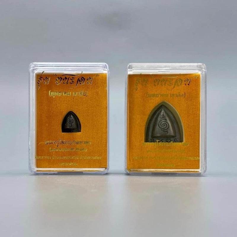 Phaan Thai luck amulet set two triangular metal amulets in clear plastic cases on orange backing for home blessings