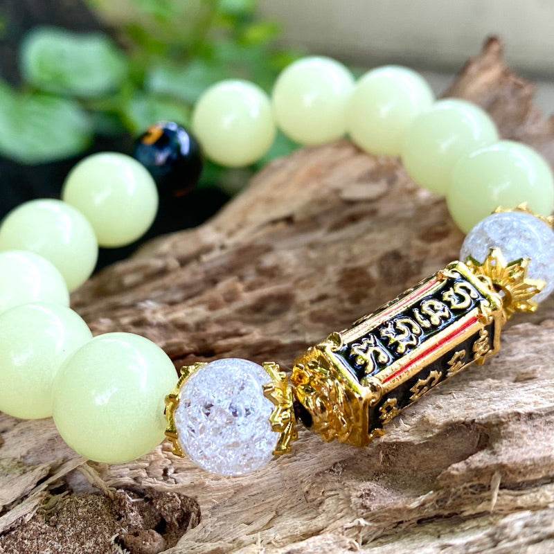 Thai billionaire takrud amulet bracelet with pale green beads gold filigree and crackle beads
