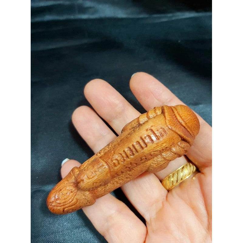 Phalad Khik Phet Amulet for Love, Wealth, and Protection Yellow (multi-colored wood)