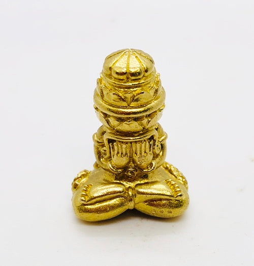 Gold Phang Phakhan amulet for good fortune featuring intricate design and traditional significance