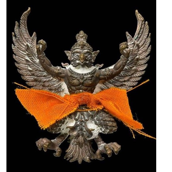 Phaya Garuda amulet for sale with detailed wings and orange cloth wrap by Thai Blessing Co