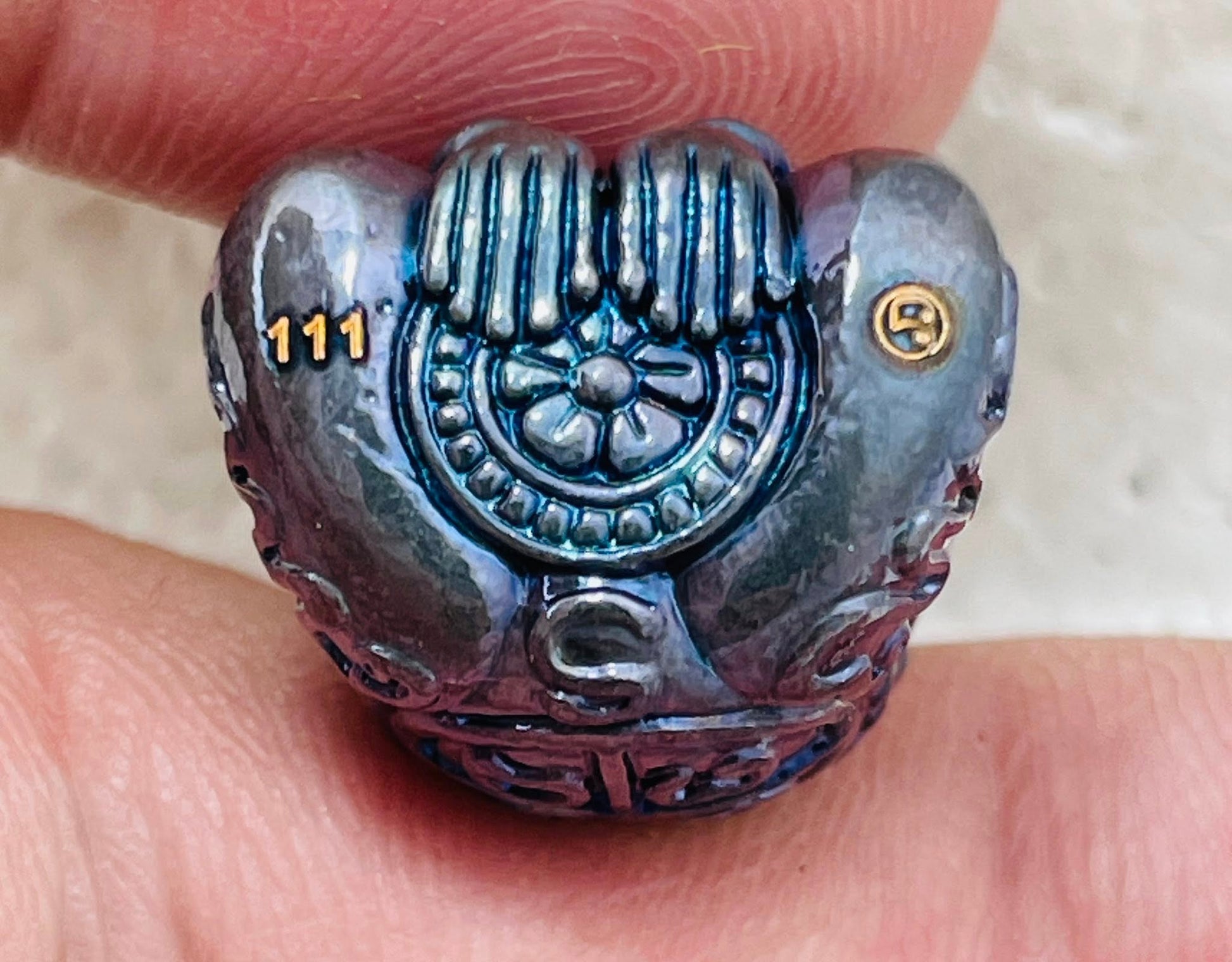 Phaya Kob Kin Duean amulet with intricate design and lucky number 111 for spiritual protection