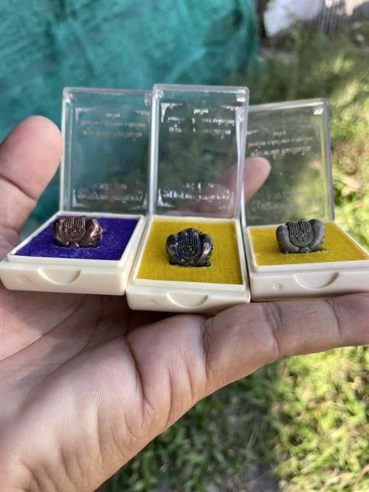 Three Phaya Kob Kin Duean Amulets in Display Cases with Colorful Bases by Thai Blessing Co