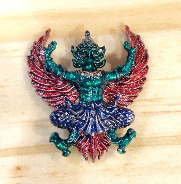 Colorful Phaya Krut amulet for protection featuring vibrant wings and intricate details