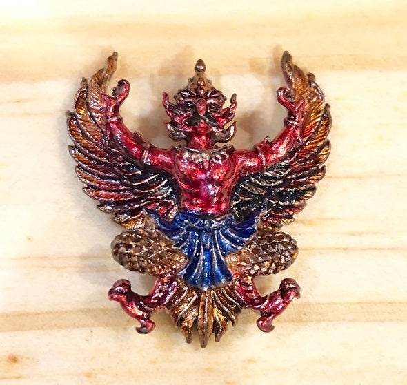 Phaya Krut amulet for protection with intricate details and vibrant colors for spiritual strength