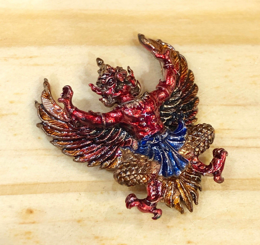 Colorful Phaya Krut amulet for protection featuring elaborate detailing and vibrant colors