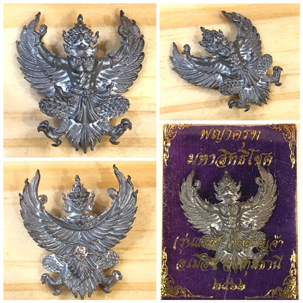 Detailed Phaya Krut amulet for wealth and protection with intricate design and vibrant colors