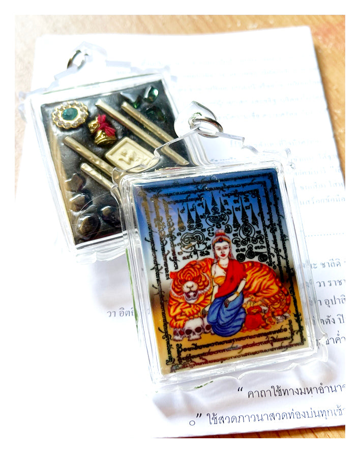 Phayak Naree tiger goddess amulet rectangular Thai pendant in clear case showing woman with tiger