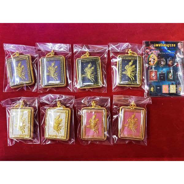 Phet Phaya Thon charm for attraction displayed in colorful pouches for enhancing luck and fortune
