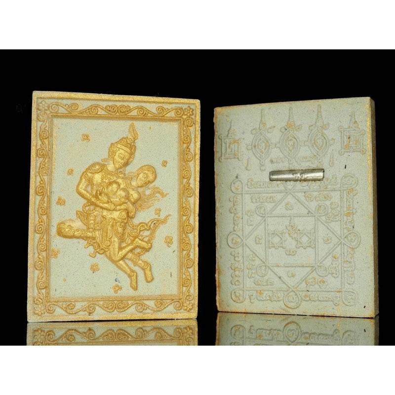 Phet Phaya Thon charm for attraction featuring intricate gold designs and religious symbols on the front
