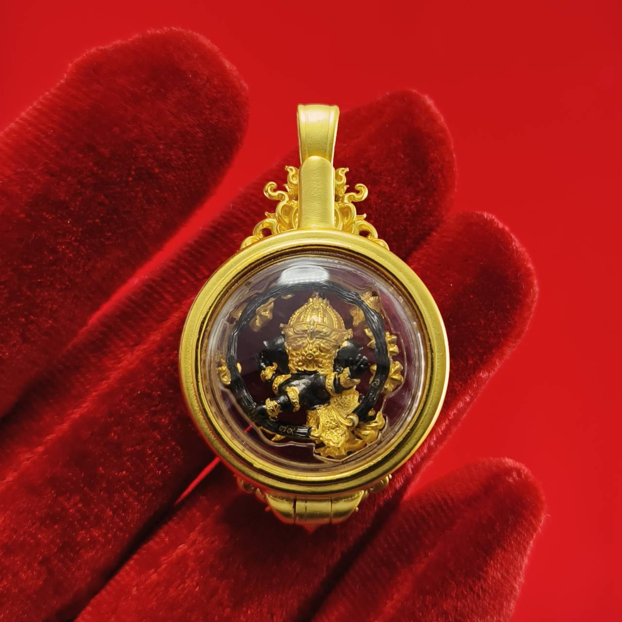 Phra Brahma amulet for protection in ornate gold casing, showcasing intricate details and craftsmanship