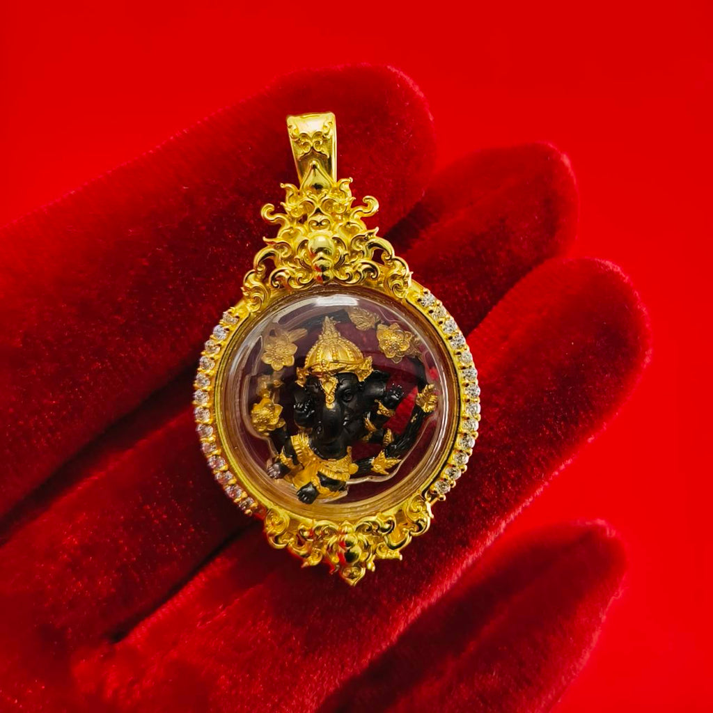 Gold Phra Brahma amulet for protection in ornate frame, ideal for spiritual decor and belief