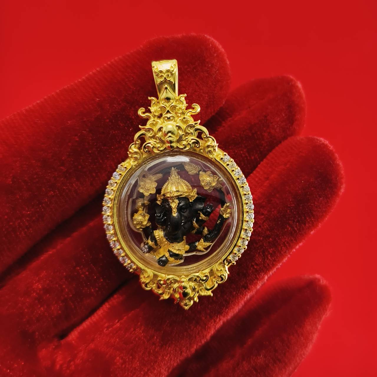 Gold Phra Brahma amulet for protection in ornate frame, ideal for spiritual decor and belief