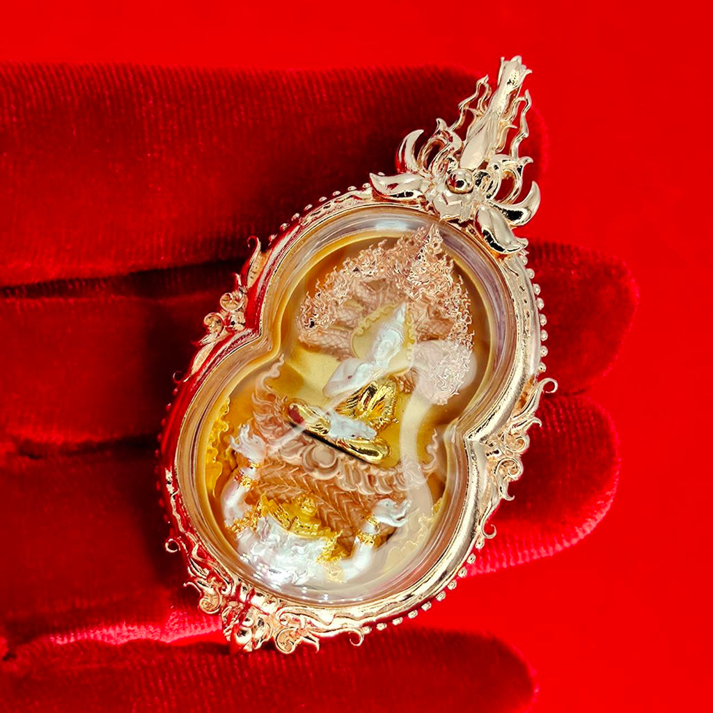 Phra Naga Prok amulet for protection enclosed in ornate casing, ideal for spiritual decoration.