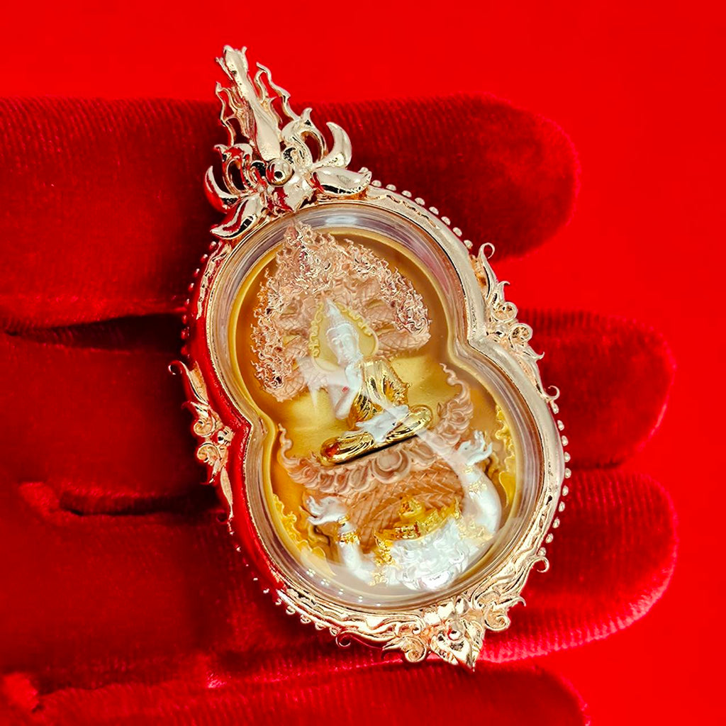 Phra Naga Prok amulet for protection in ornate gold setting showcasing intricate craftsmanship