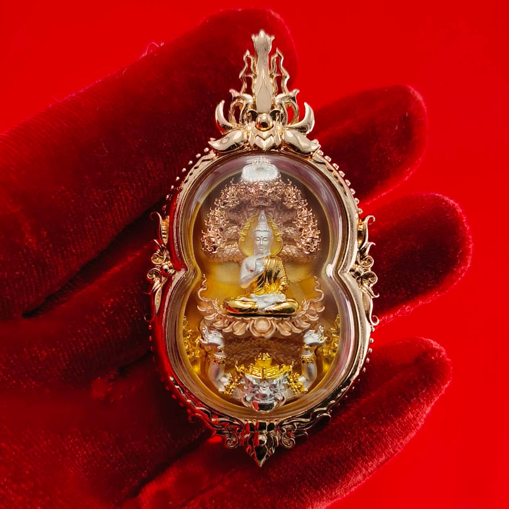 Phra Naga Prok amulet for protection with intricate details and a gold finish, ideal for spiritual decor