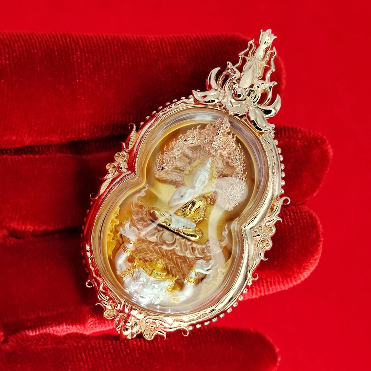 Phra Naga Prok amulet for protection with intricate details and a luxurious frame