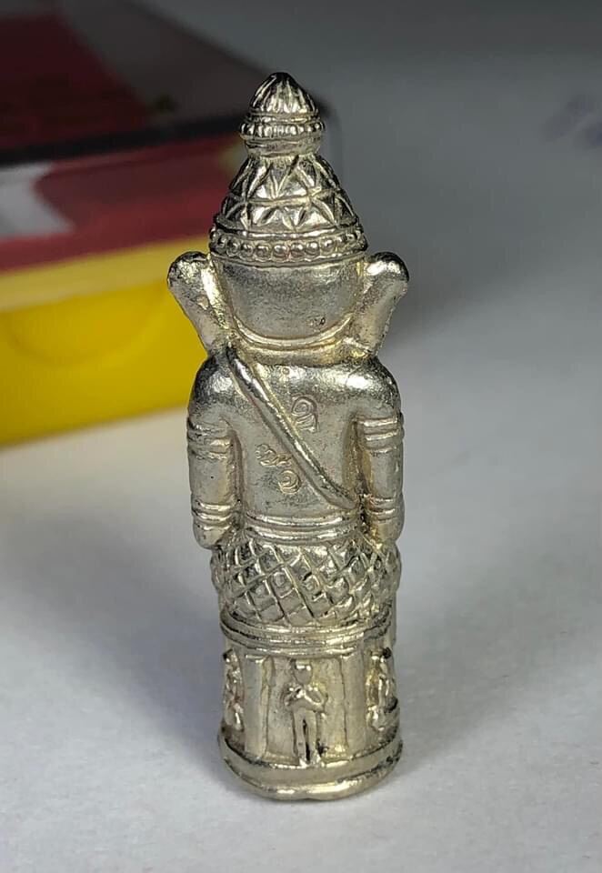 Silver Phra Phikanet amulet for blessing with intricate traditional design and detailed carvings