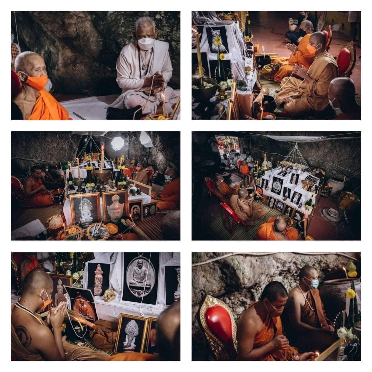 Monks performing a ritual praying around Phra Phikanet amulet for blessing in a sacred cave setting