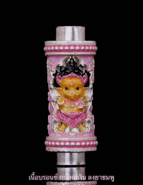 Phra Phikanet Takrud amulet in pink with intricate detailing and protective features for spiritual use