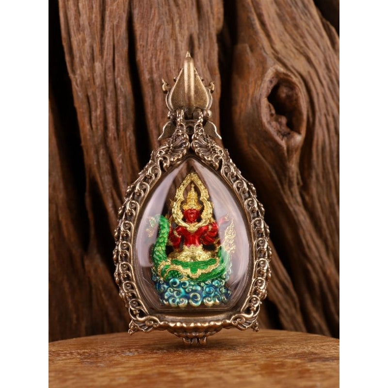 Phra Phrom amulet for prosperity in ornate frame with colorful detailing for spiritual enrichment