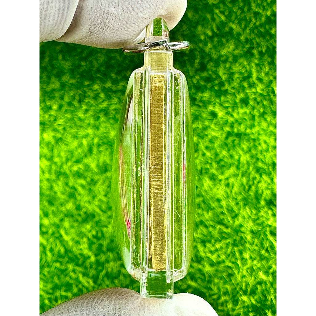 Phra Phrom amulet for sale encased in clear protective cover held by gloved hand