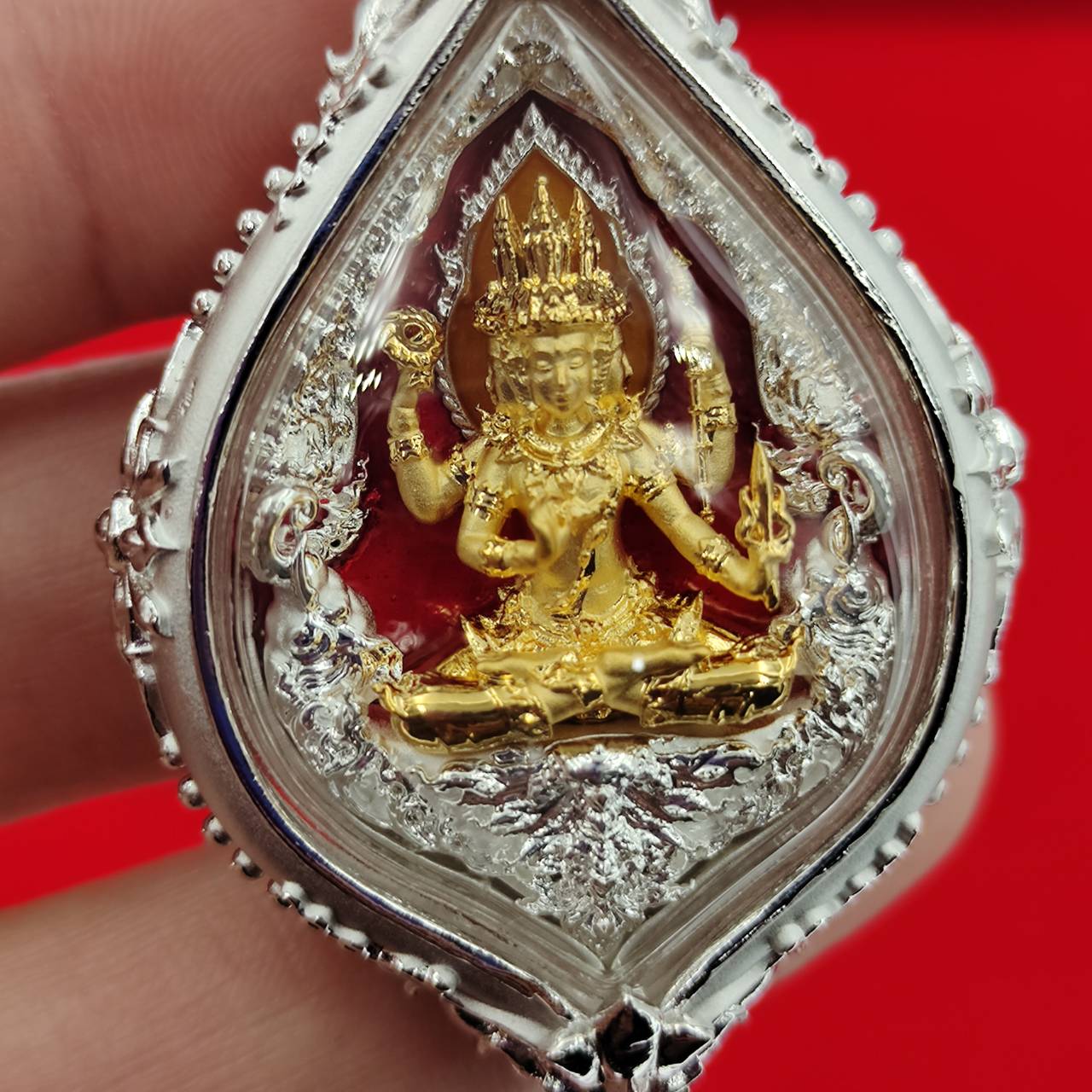 Phra Phrom amulet Supreme Divine Blessings & Prosperity in a decorative crystal casing