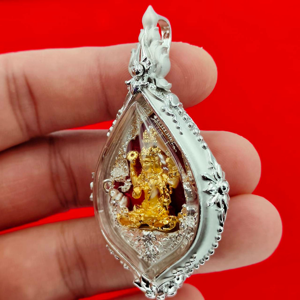Phra Phrom amulet Supreme Divine Blessings & Prosperity in a decorative silver casing for spiritual protection
