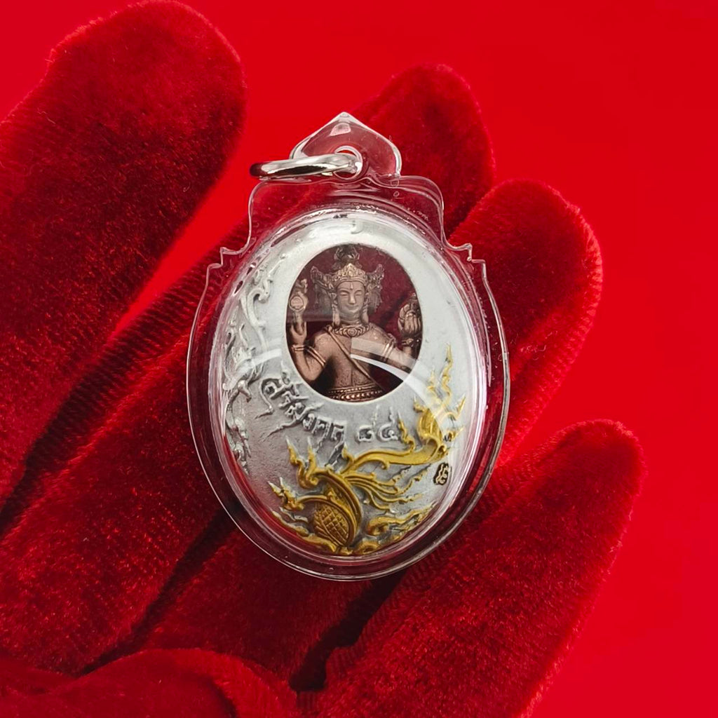 Phra Phrom Thai amulet in clear casing with intricate design, perfect for spiritual protection