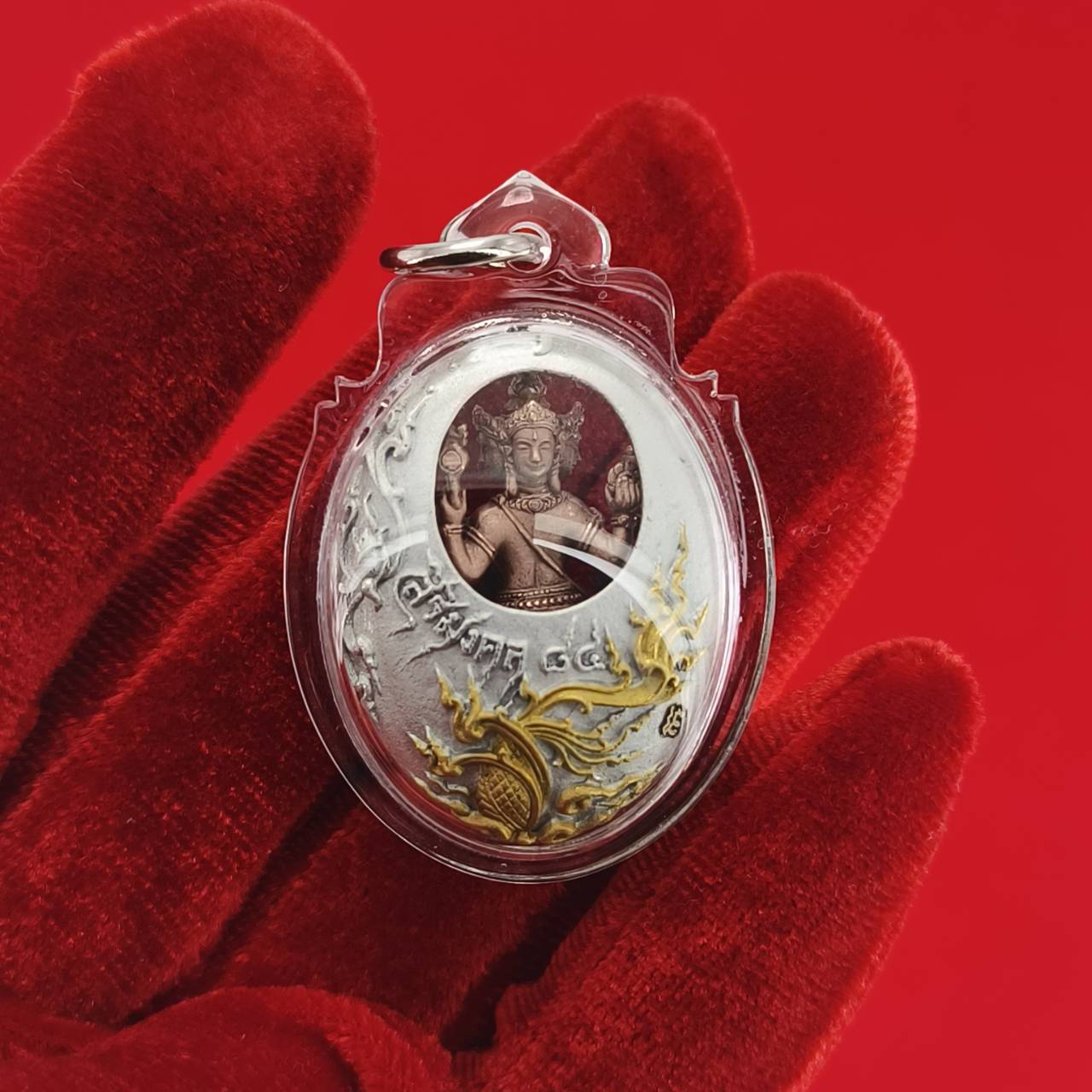 Phra Phrom Thai amulet in clear casing with intricate design, perfect for spiritual protection