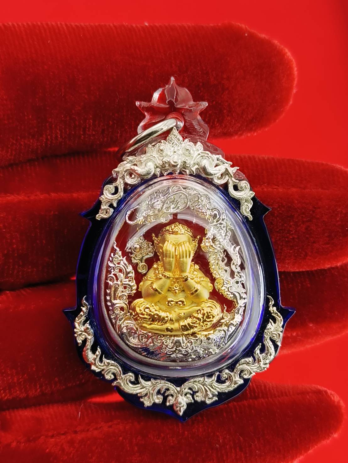 Phra Pidta amulet for wealth in ornate gold and silver design, ideal for attracting prosperity