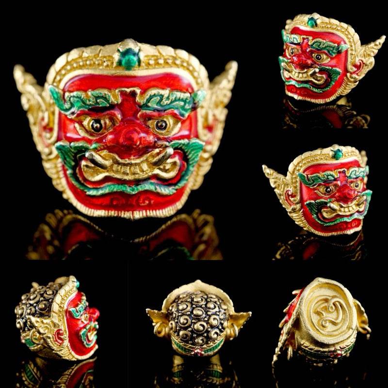 Phra Pirap amulet for power featuring intricate designs in vibrant colors and a powerful protective face