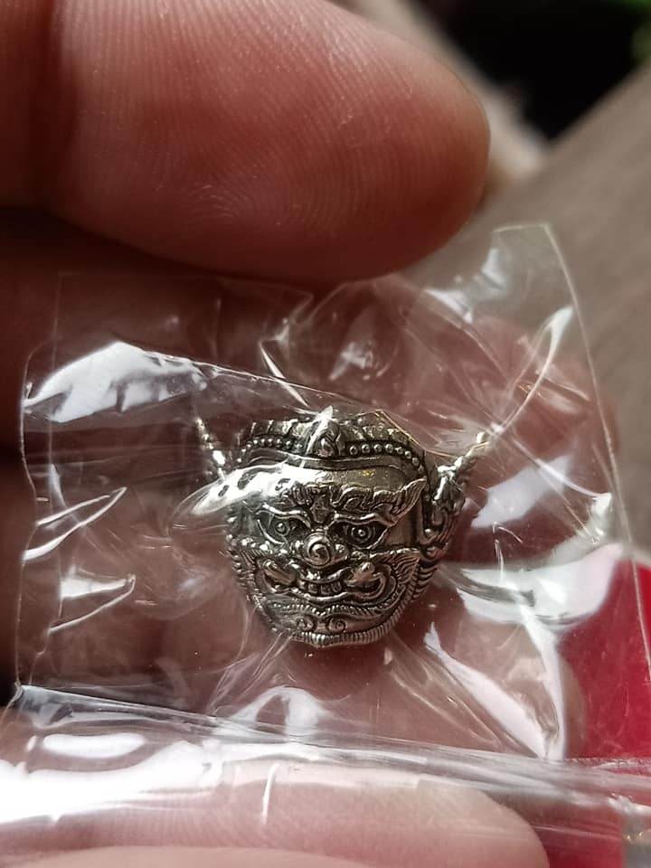 Phra Pirap amulet for power in silver packaging, showcasing intricate details and craftsmanship