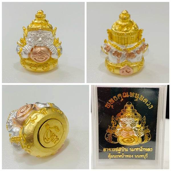 Decorative Phra Rahu amulet for luck featuring intricate golden and silver details