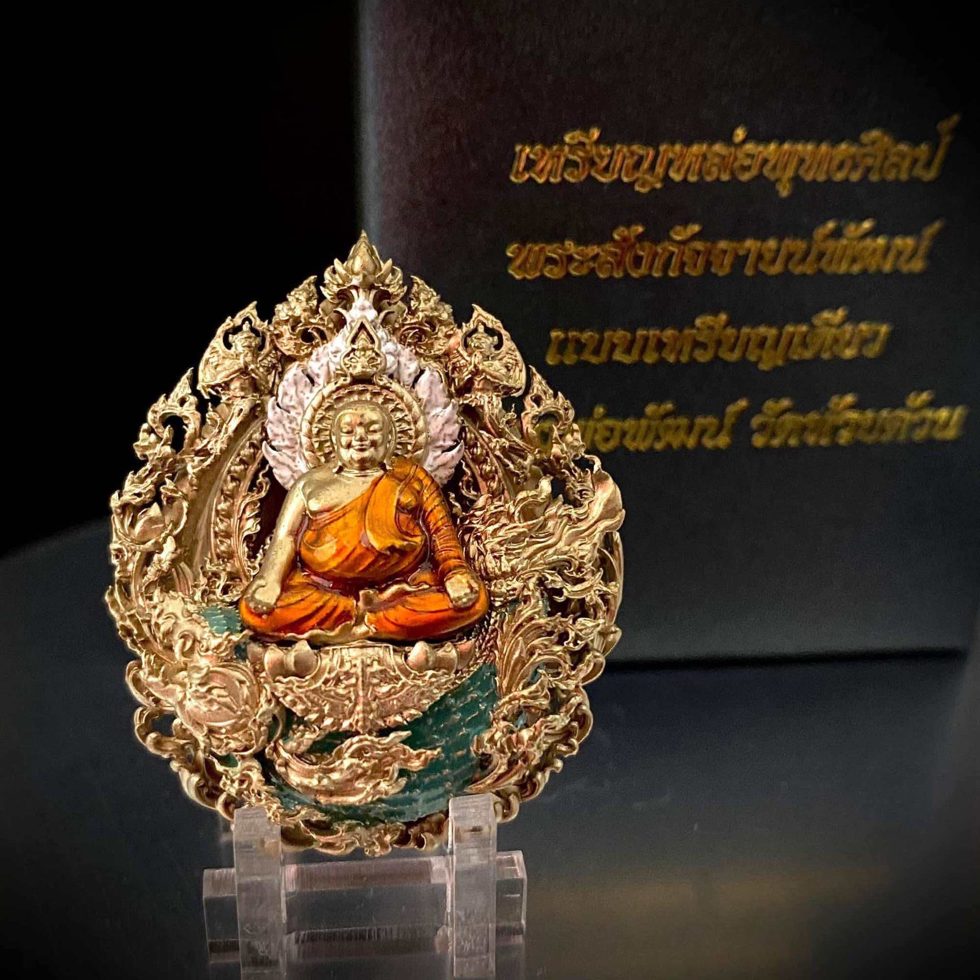 Phra Sangkajai and Phra Upakut amulet intricately designed for spiritual protection and decorative display