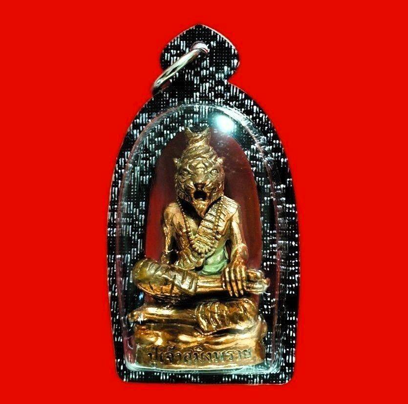 Phu Chao Saming Phrai spirit figurine in ornate casing, ideal for feng shui and religious practices