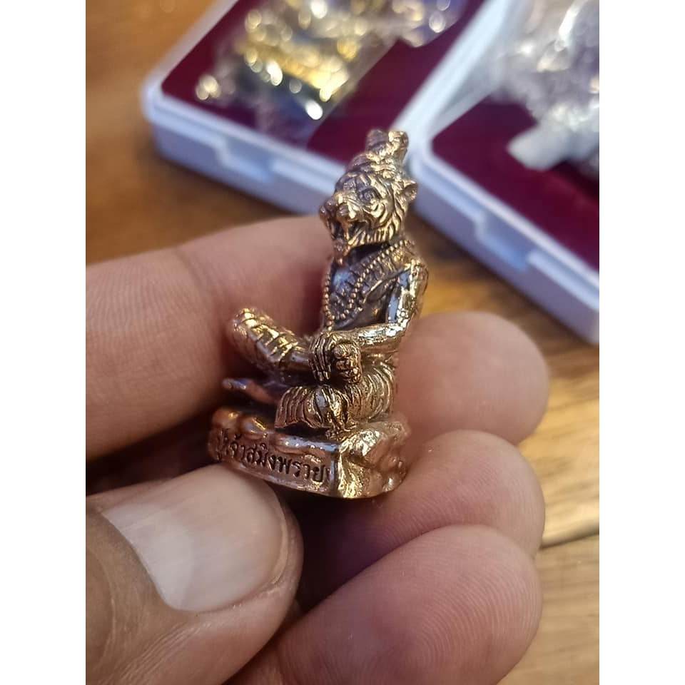 Phu Chao Saming Phrai spirit figurine in gold color, small and detailed for feng shui and religious practices