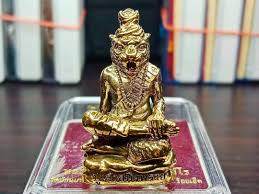Phu Chao Saming Phrai spirit figurine in gold finish, representing spiritual protection and prosperity