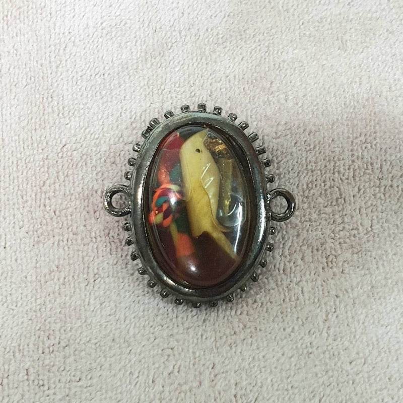 Powerful communication amulet Thailand in an ornate frame featuring vibrant colors and intricate details