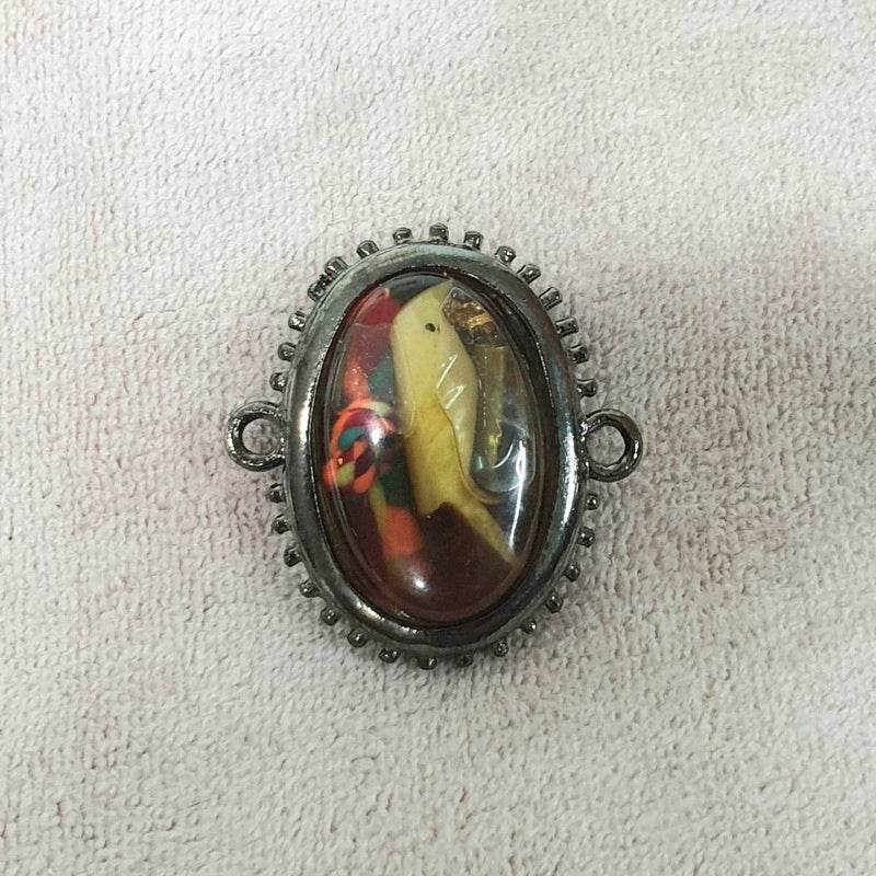 Powerful communication amulet Thailand with intricate design and detailed imagery for spiritual enhancement