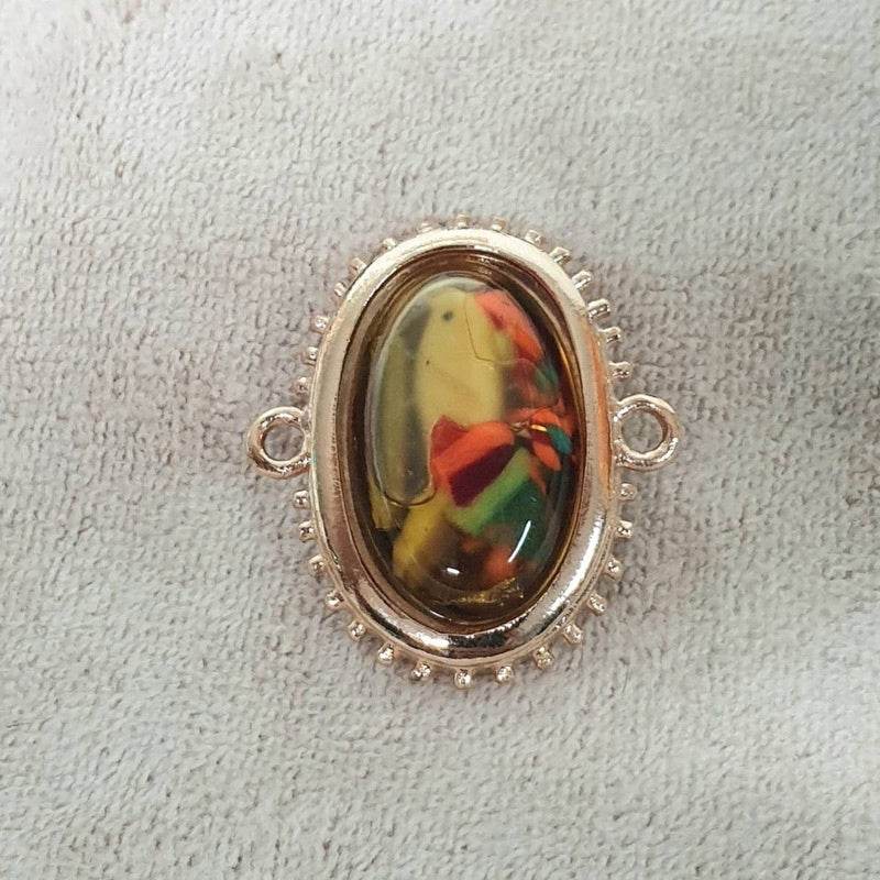 Powerful communication amulet Thailand with colorful design in oval frame for spiritual enhancement